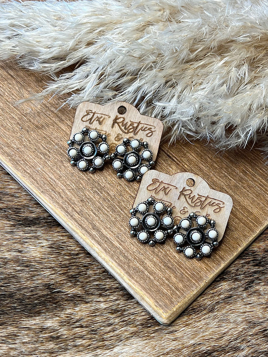 White six shooter earrings
